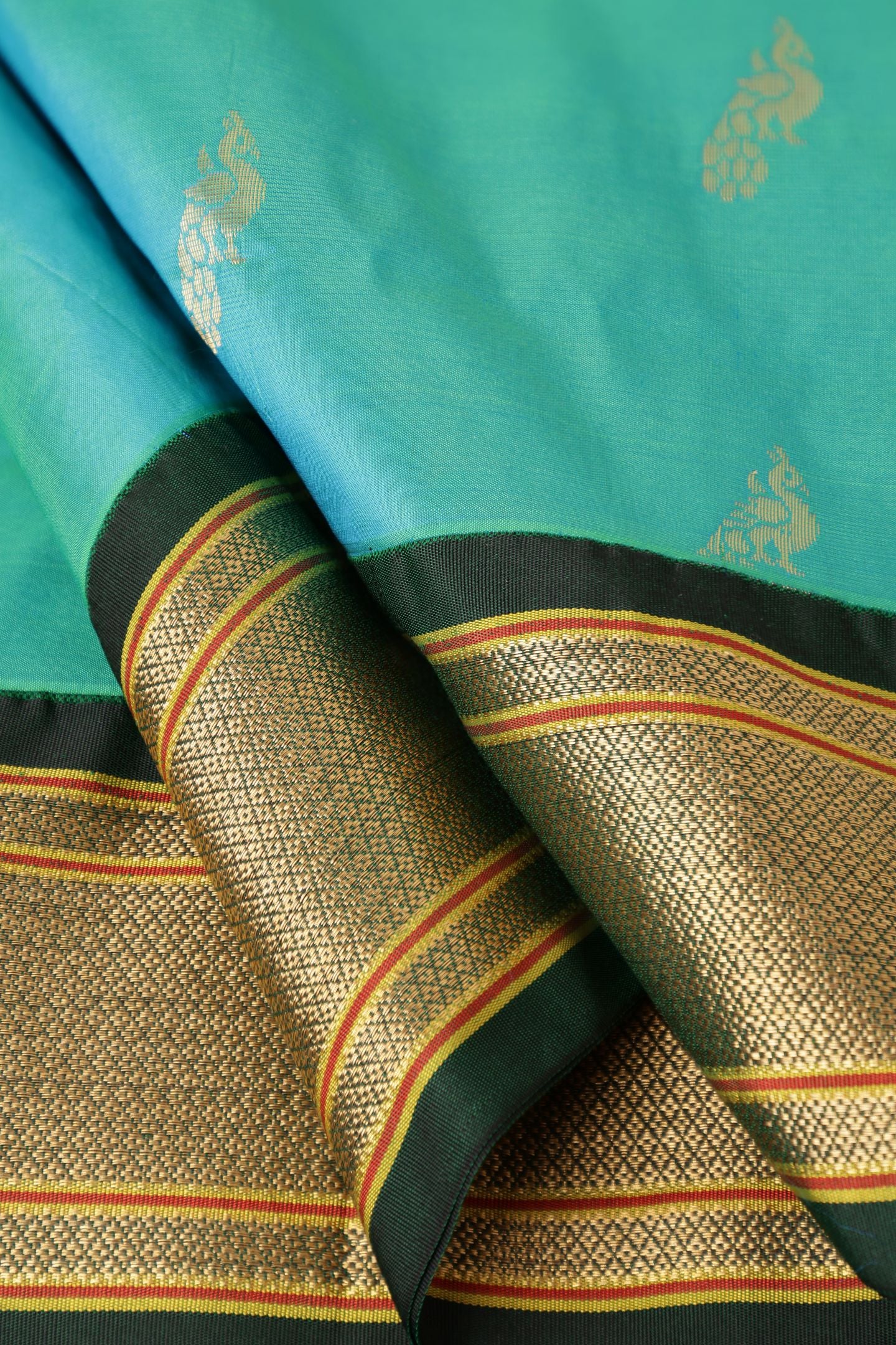 Kadiyal All Over Peacock Butta Saree